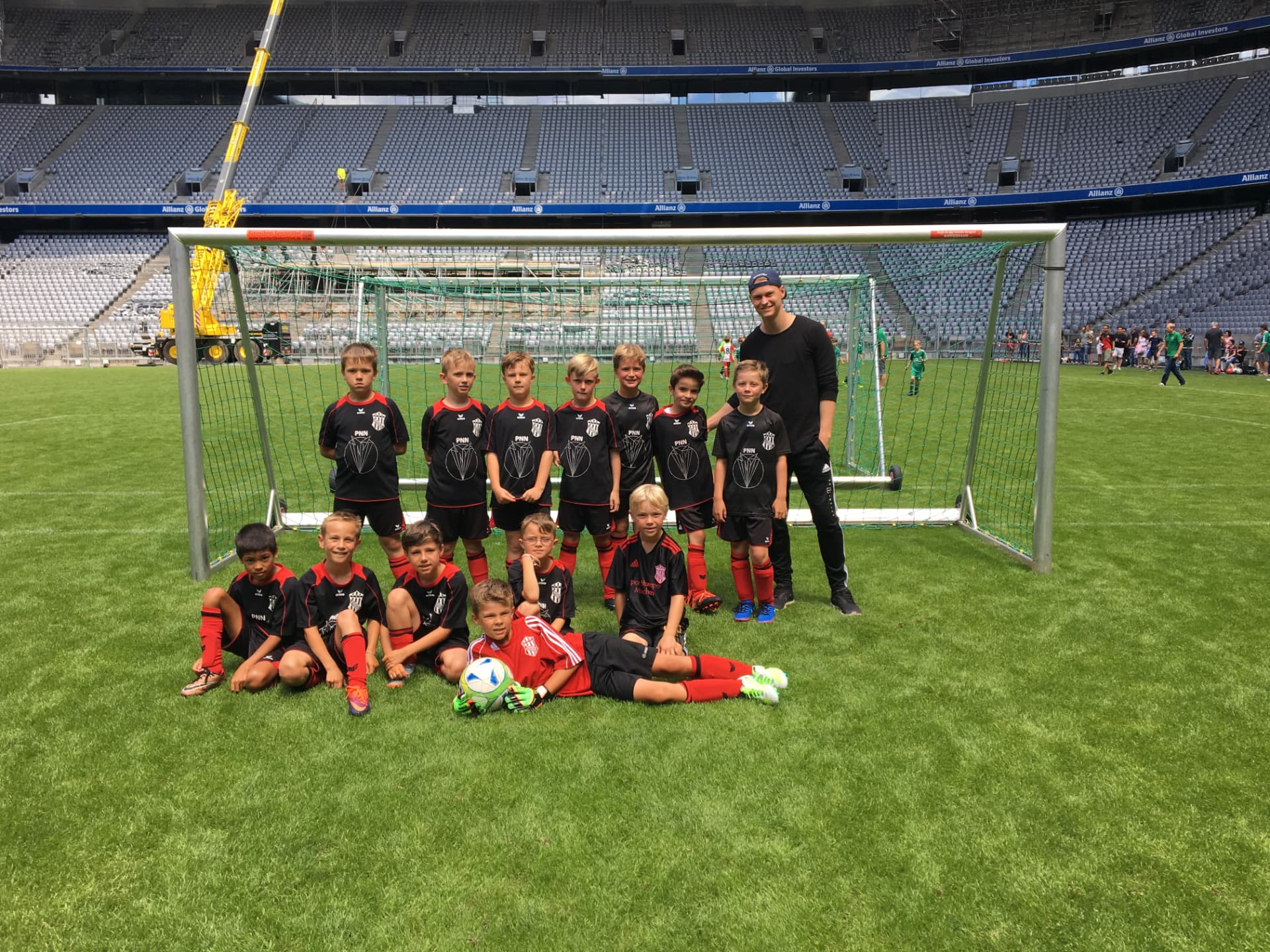 Youth team with coach Fabian Küster at the Allianz Arena