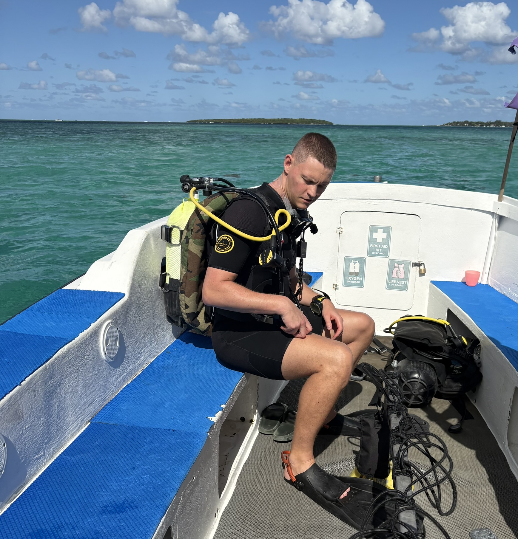 Fabian Küster in diving gear on a boat