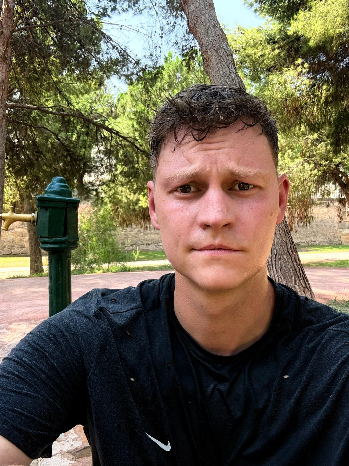 Portrait of Fabian Küster in a park